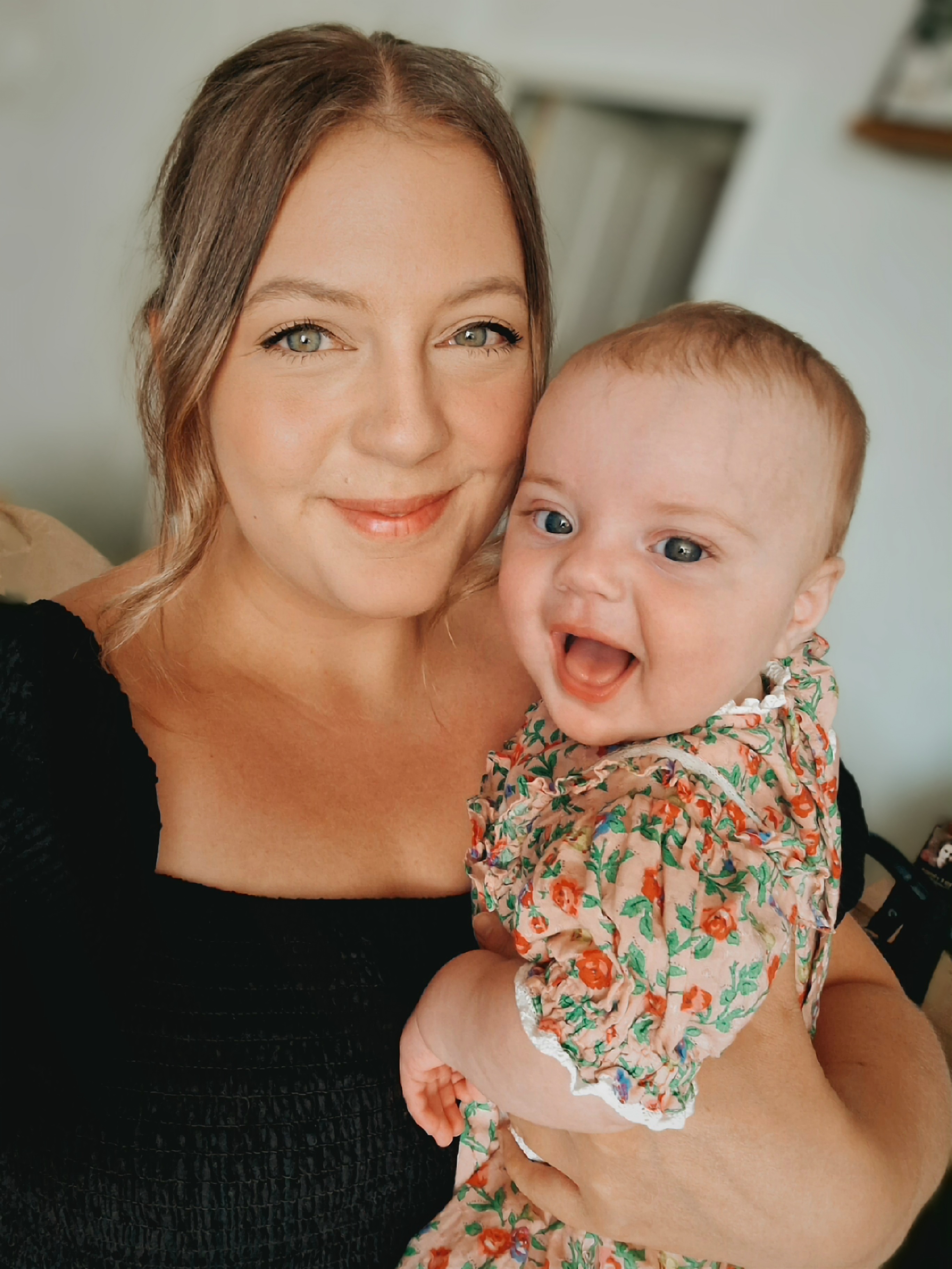 Abbie and her daughter Ada smiling