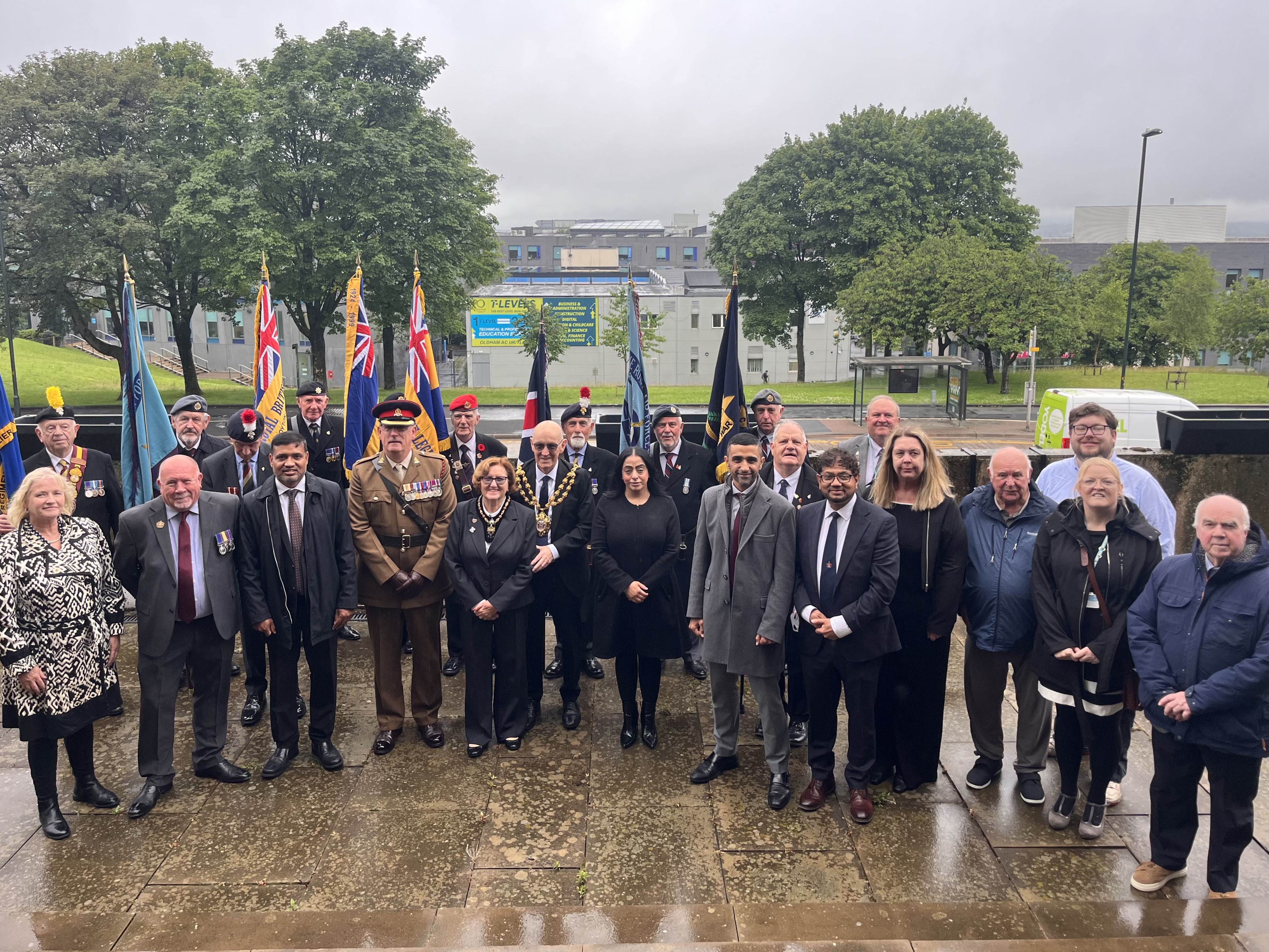 Cllr Arooj Shah and the Mayor, Cllr Eddie Moores, pictured with members of the Armed Forces and local councillors in Oldham.