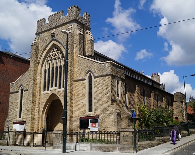 View of the outside of the United Reform Church on a sunny day